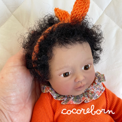 Moly Afro hair and dark skin