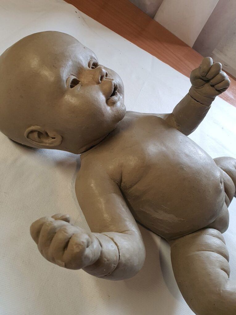 Escultura de bebé reborn